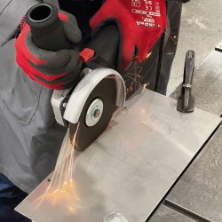 Kotni brusilnik 1100W z integrirano drsno sklopko