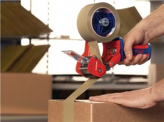 Odvijalnik lepilnega traku ročni